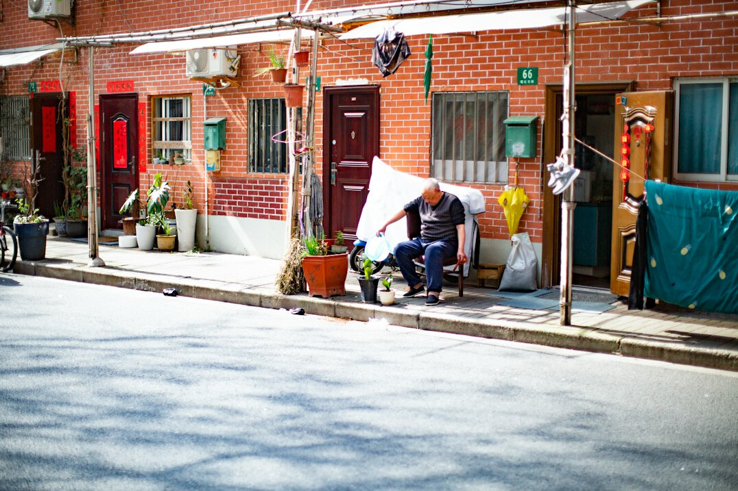 elderly man gardening