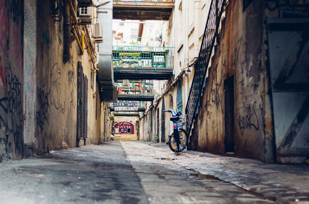 homeless man in city alley