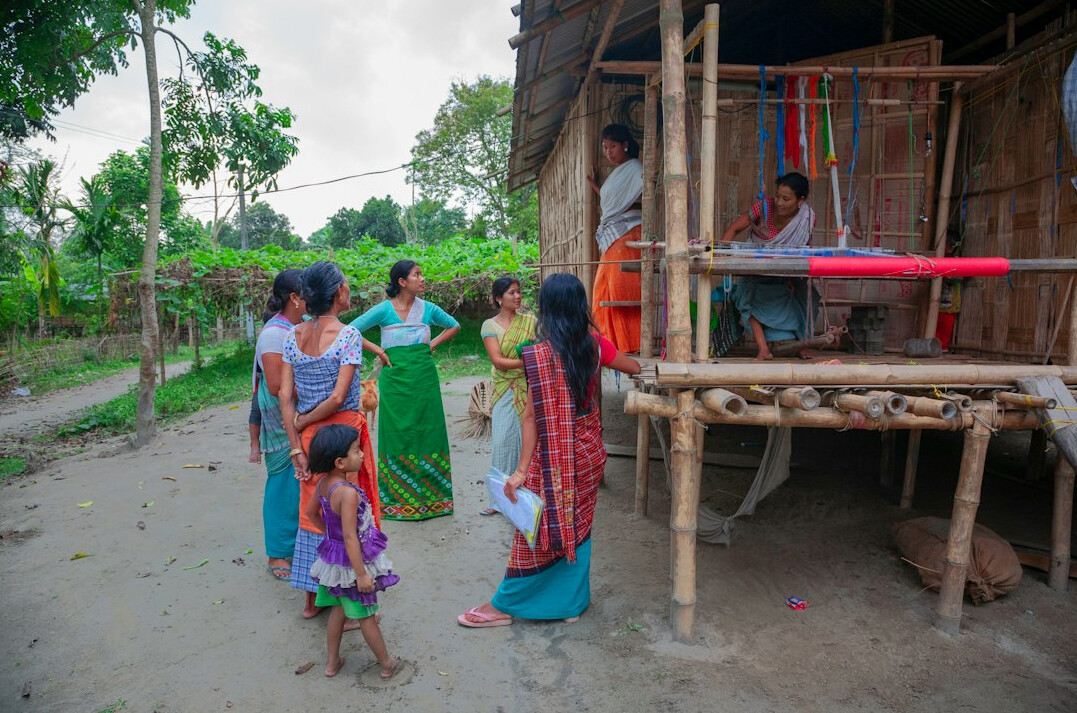 photographer documenting village life